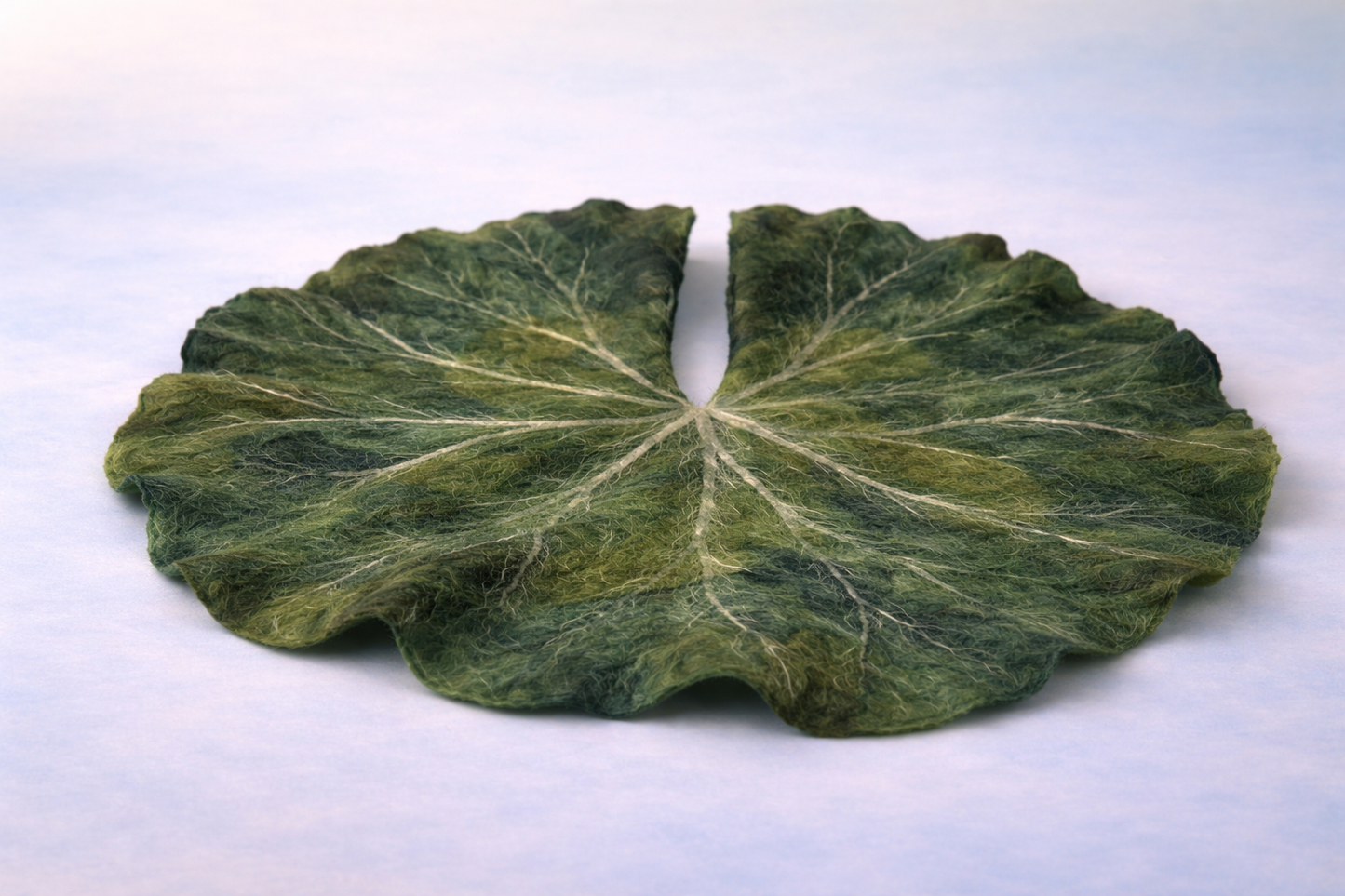Handcrafted felted water lily leaf for newborn and sitter photography styling. Organic texture and natural detailing.