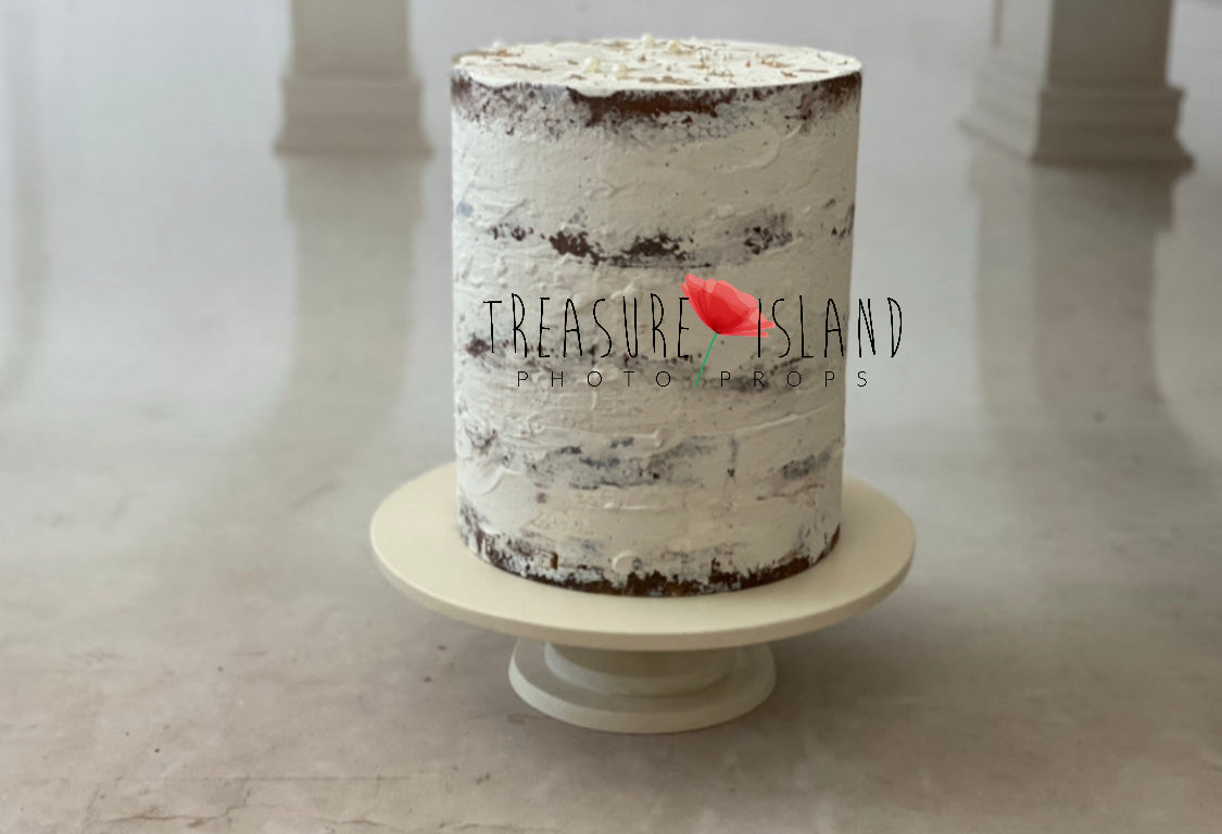 Close-up of realistic sponge layers on handmade styrofoam Cake Smash cake prop