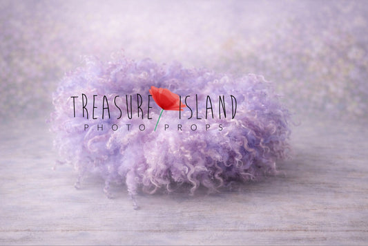 Luxury hand-felted newborn photography prop nest in lavender, purple and blush tones, crafted from natural curly sheep wool. Treasure Island Photo Props.