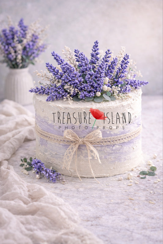 Artificial lavender cake smash prop – 25 cm textured fake cake with structural paste, pastel lilac finish and lace bow, photography prop from Cake Smash collection