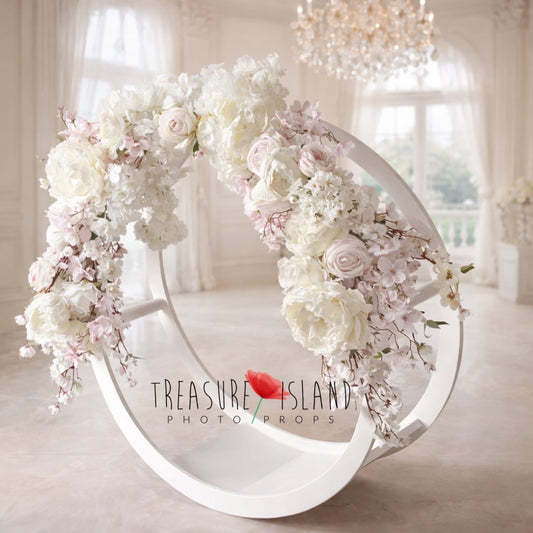 Luxury white round photography prop decorated with ivory and blush flowers, cascading blossoms and soft pastel floral arrangement for newborn sessions