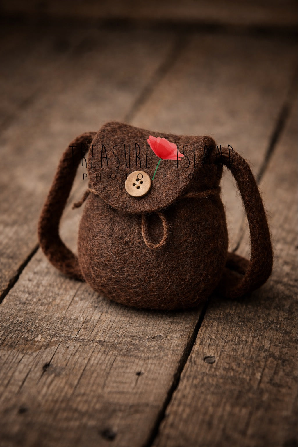 Luxury handcrafted chocolate brown felt mini backpack, artisan newborn photography prop (14 cm) displayed on rustic vintage wood
