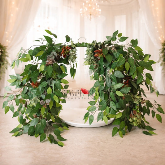 Luxury greenery swing photo prop with cascading faux leaves and botanical details – newborn and baby photography backdrop
