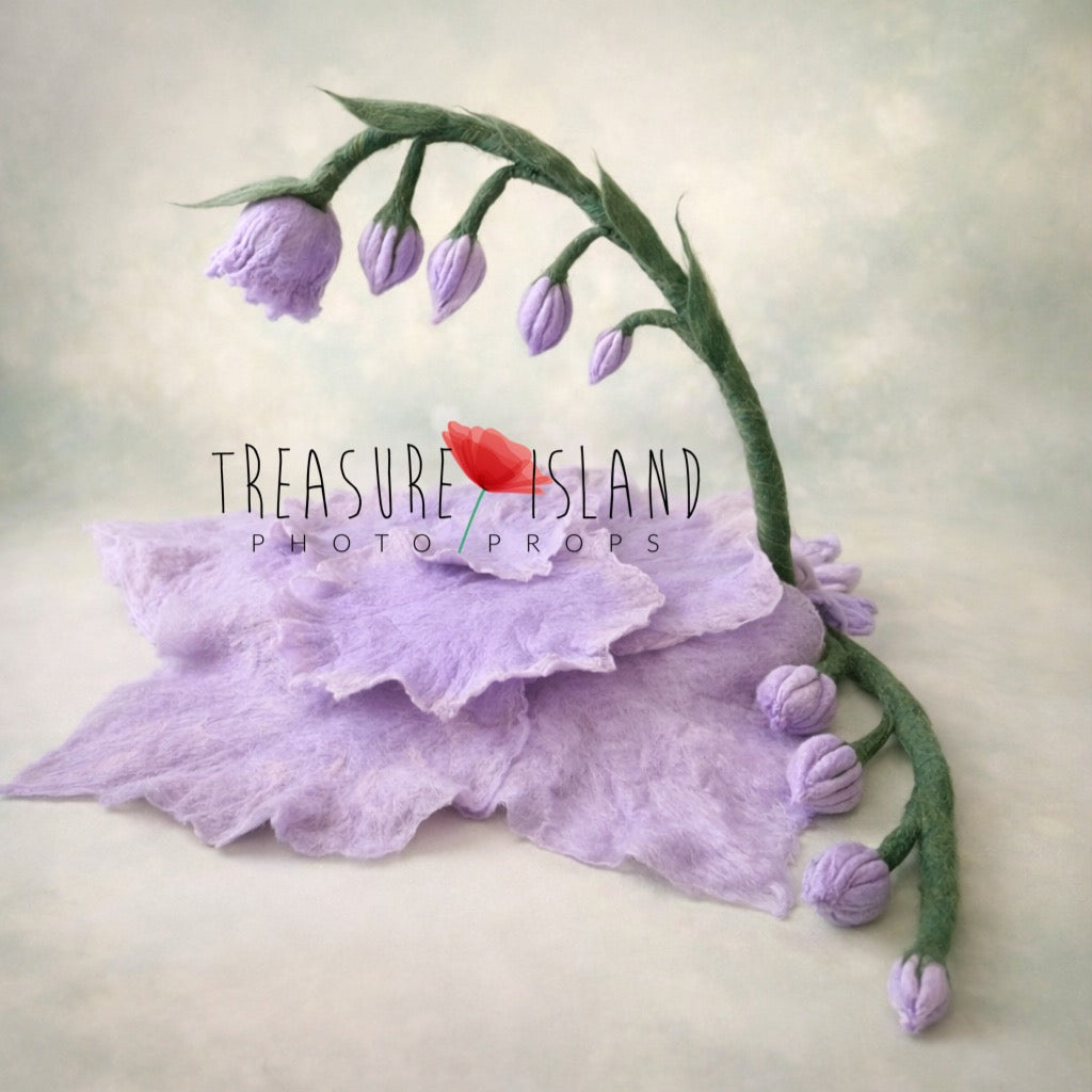 Handmade lavender felt flower bed prop with curved green stem and hanging buds, fine art botanical newborn and sitter photography prop from Thumbelina collection by Treasure Island Photo Props