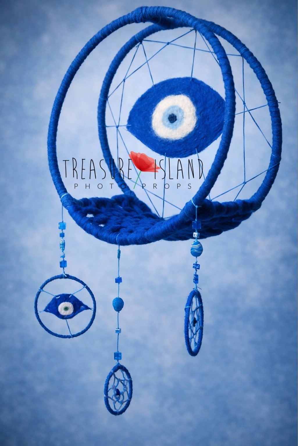 Handmade wool dream catcher with felted evil eye (nazar), blue wall decor wrapped in wool, boho nursery or spiritual home decoration
