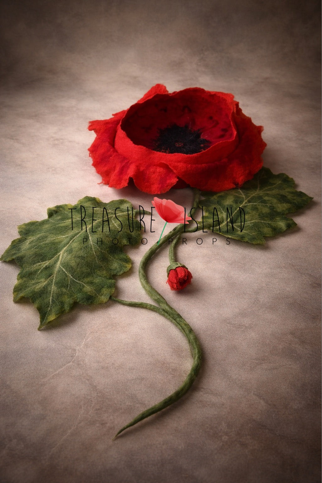 Handmade red felted poppy flower bowl with sculptural stem and large botanical leaves for newborn photography styling