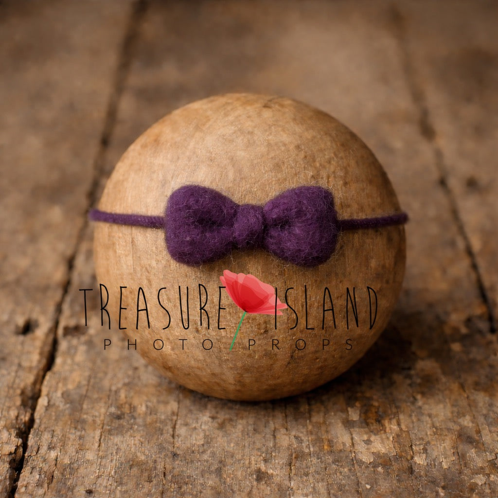 Hand-felted eggplant bow headband on wool string, newborn photography prop