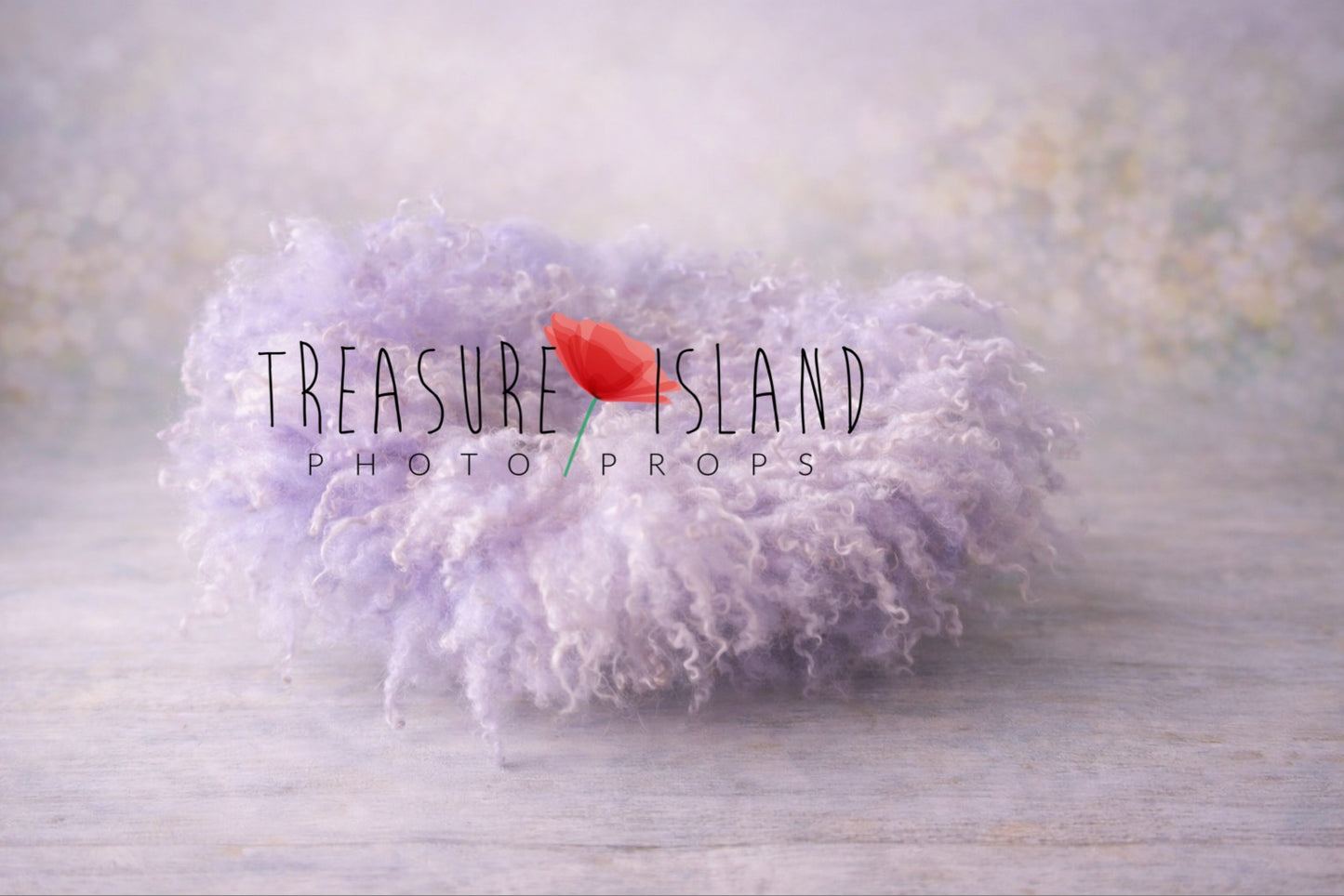 Hand-felted newborn photography nest in soft lavender color, made from natural curly sheep wool, styled on a delicate pastel backdrop. Treasure Island Photo Props.
