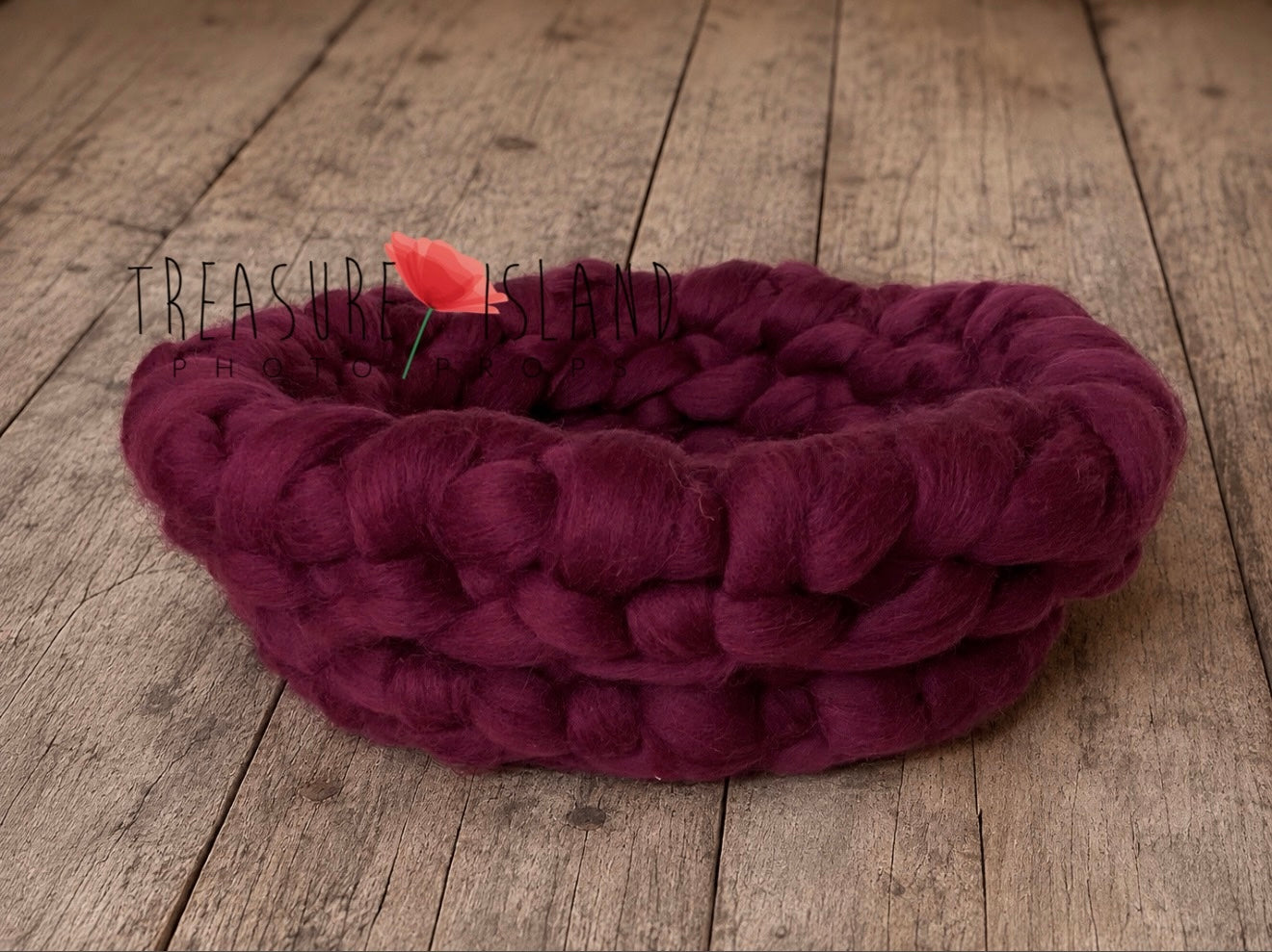 Side view of handmade chunky wool photography nest in Burgundy.