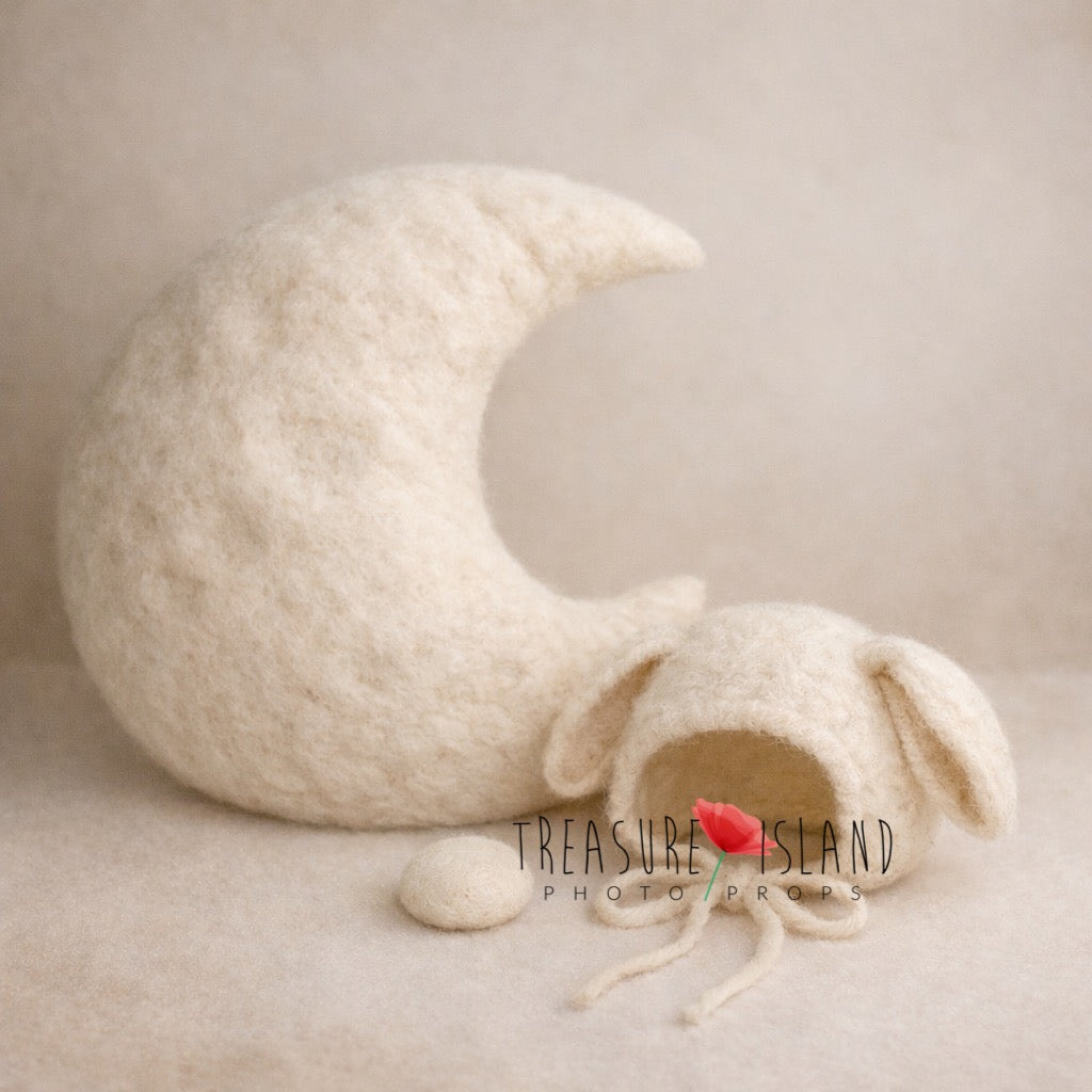 Hand-felted Moon Rabbit newborn photography set featuring a crescent moon pillow, bunny bonnet, miniature rabbit companion and rice cookie, inspired by Asian folklore and moonlit fairytale stories.
