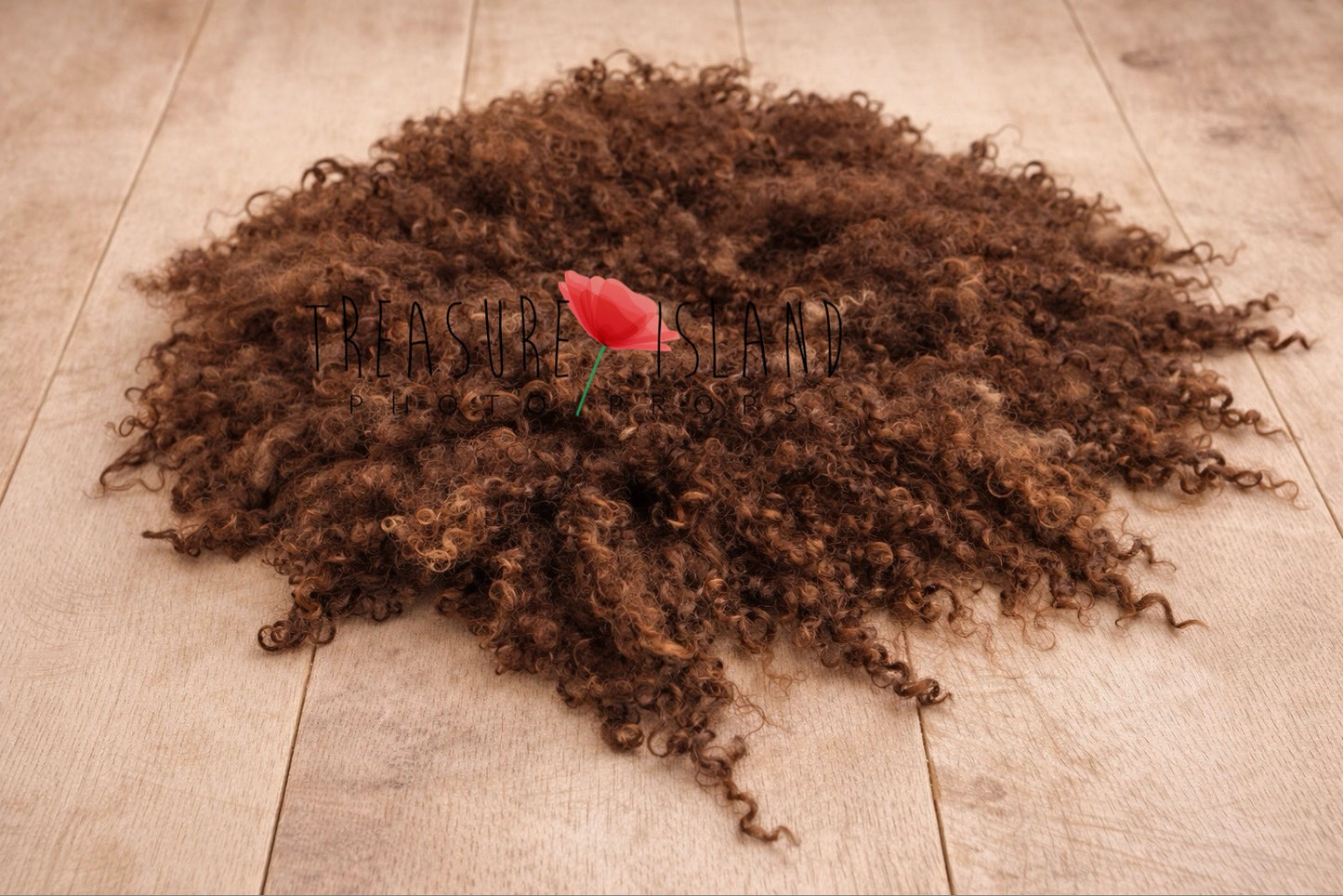 Hand-felted newborn photography blanket in warm milk chocolate brown tone, natural curly sheep wool styled on rustic wooden floor