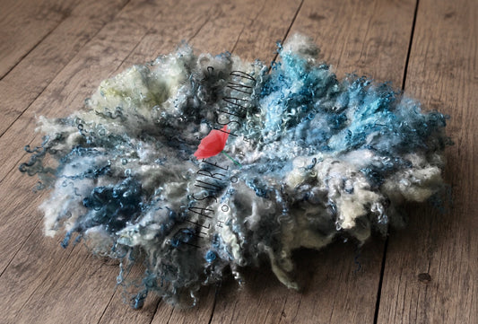 Stormy Ocean hand felted natural sheep curls blanket in blue grey and ocean tones for newborn and sitter photography