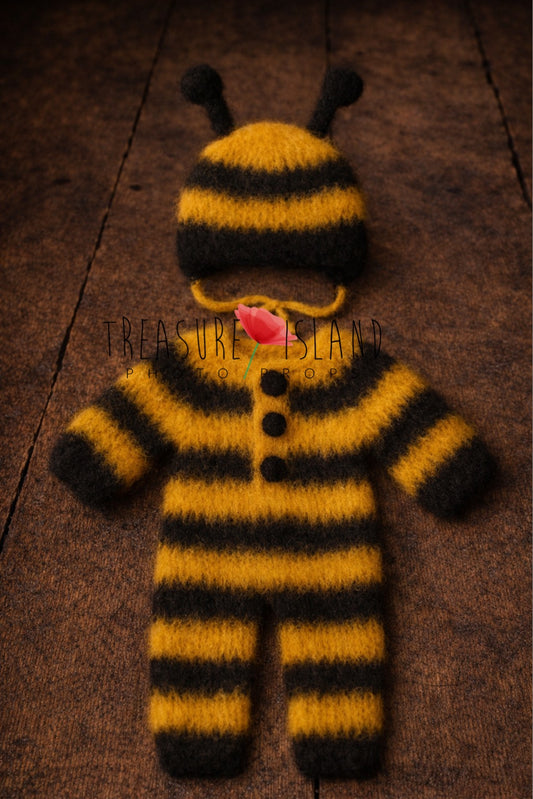 Hand-knitted bee romper and bonnet photography outfit in yellow and black stripes
