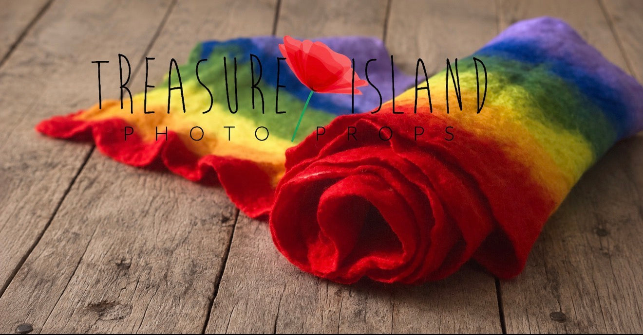 Handmade newborn photography wool wrap in intensive rainbow with naturally felted texture