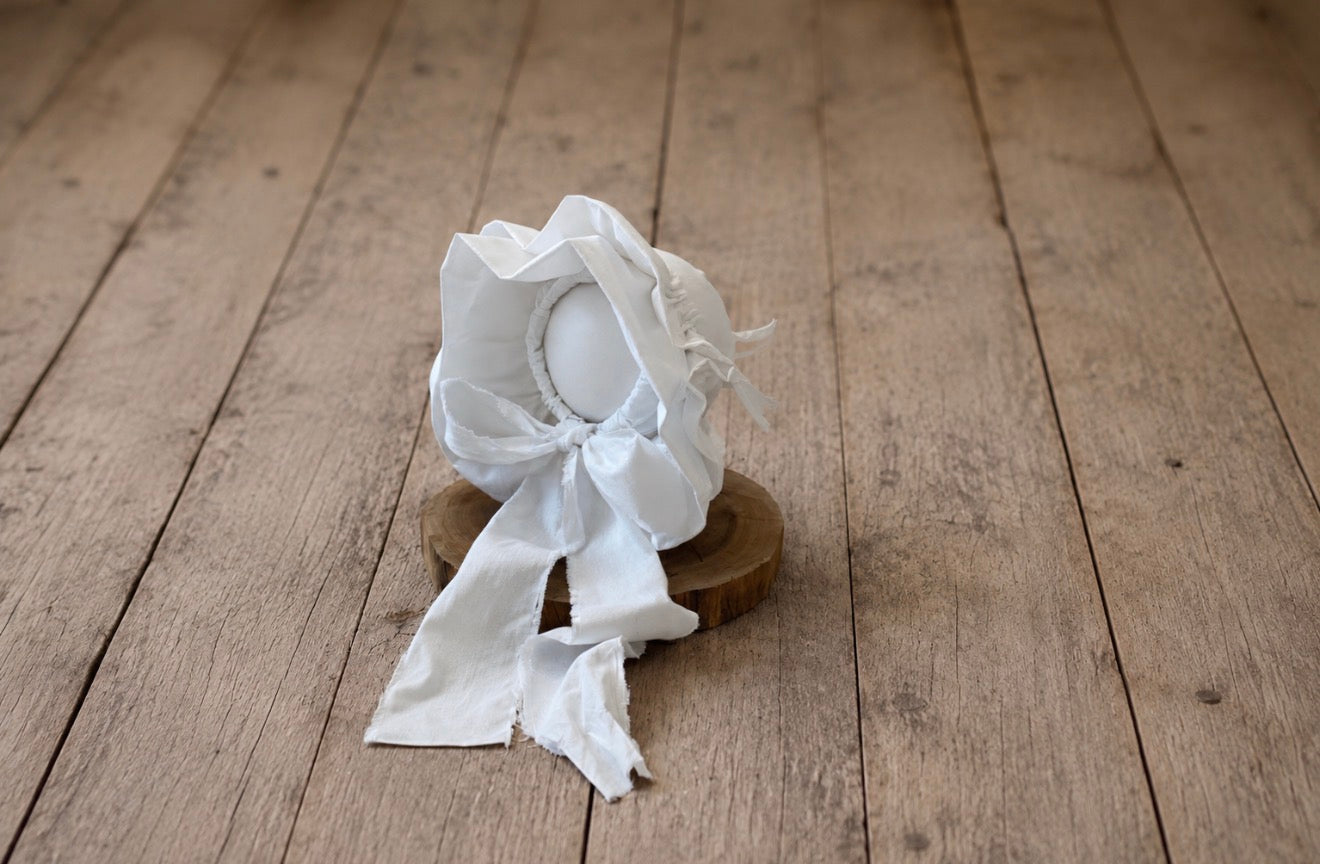 White Amelia vintage newborn bonnet with gathered brim and long fabric ties, handmade photography prop