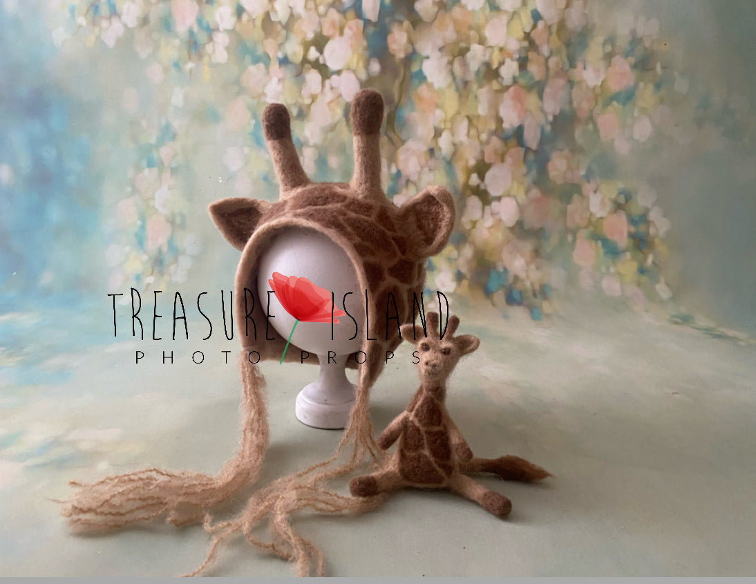 Beige and brown hand-felted giraffe bonnet with matching giraffe animal prop