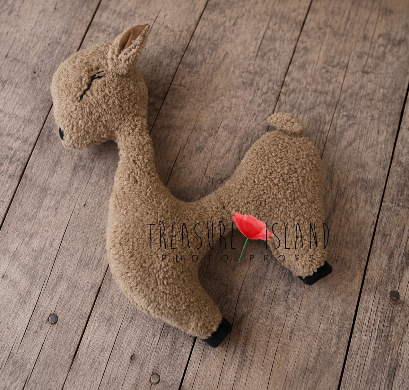 Beige sheep newborn posing pillow with long neck and embroidered face