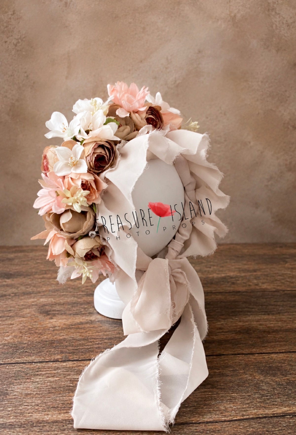 Blush and cappuccino floral bonnet with abundant flower arrangement for fine art photography