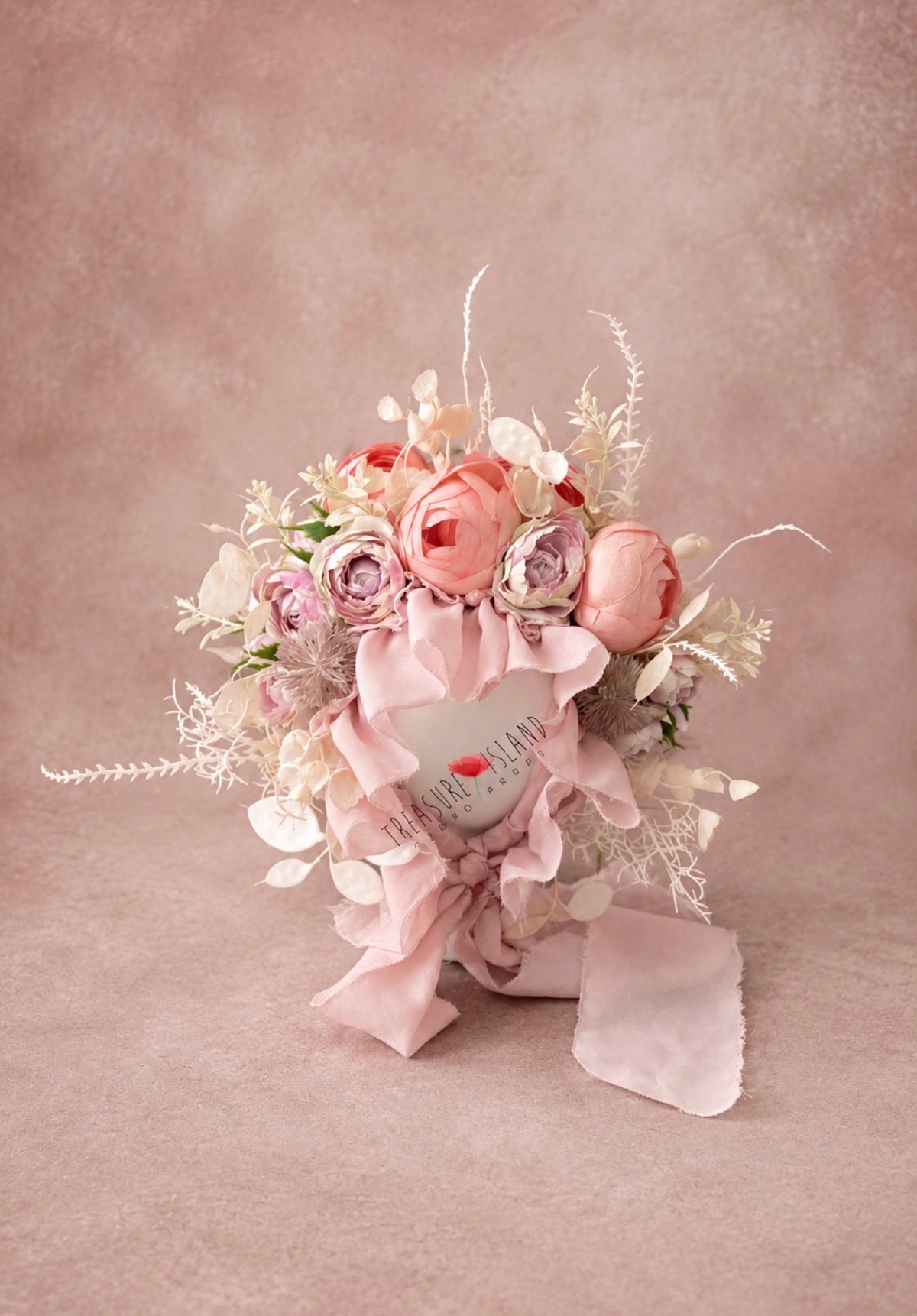 Blush coral floral bonnet with flowing pink ties for newborn and sitter photography
