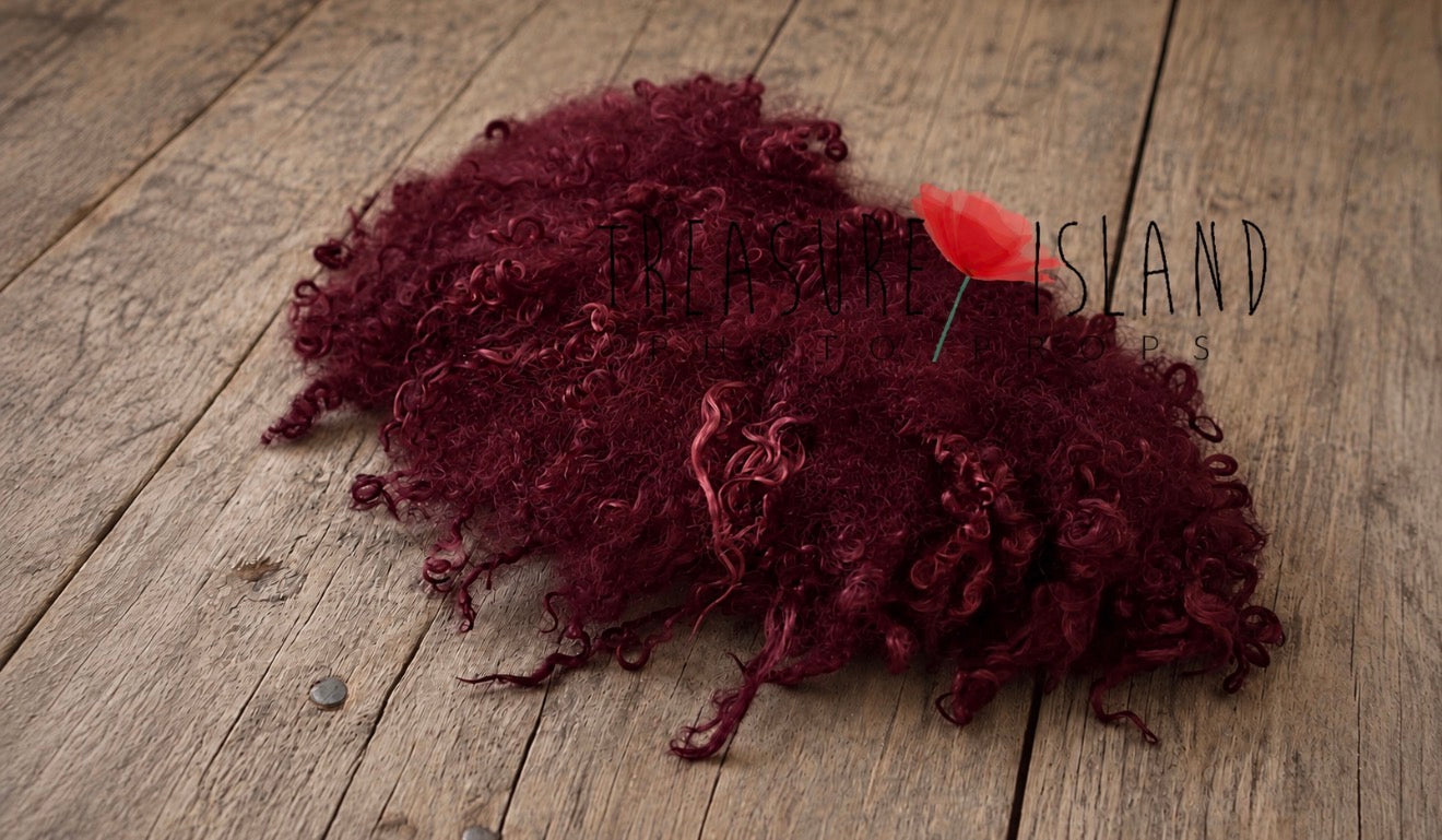 Burgundy curly wool blanket with natural sheep locks for newborn photography