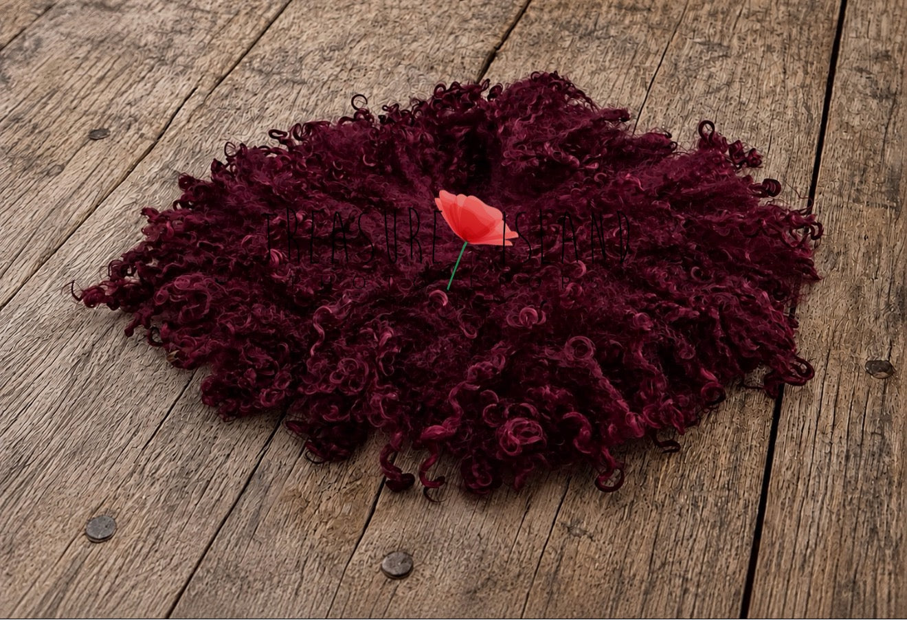 Handmade burgundy wool blanket with curly sheep locks for newborn photo sessions