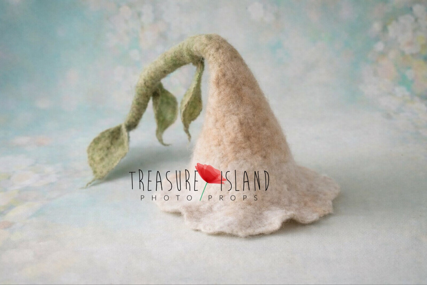 Cream hand-felted flower hat with long green stalk and leaves for newborn photography