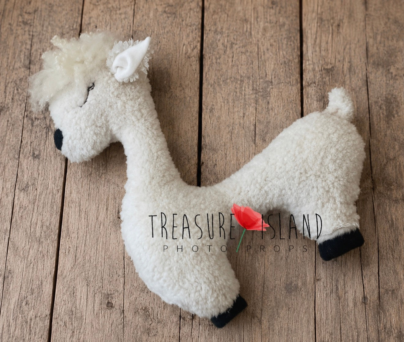 Cream white alpaca newborn posing pillow with soft textured fabric and natural curls