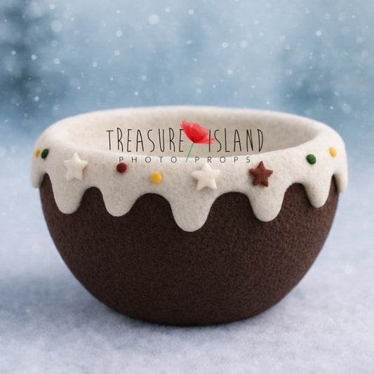Dark chocolate Cupcake Dream posing bowl with cream felt icing and colorful handmade decorations