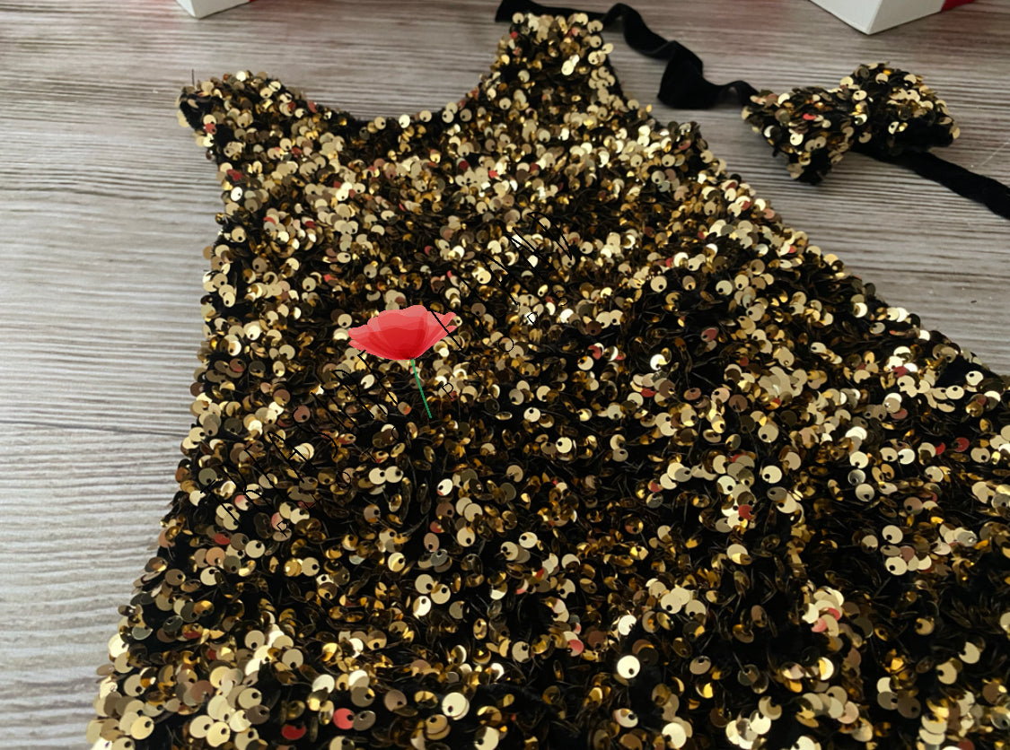 details of Black and gold sequin bubble baby photography dress with matching bow headband