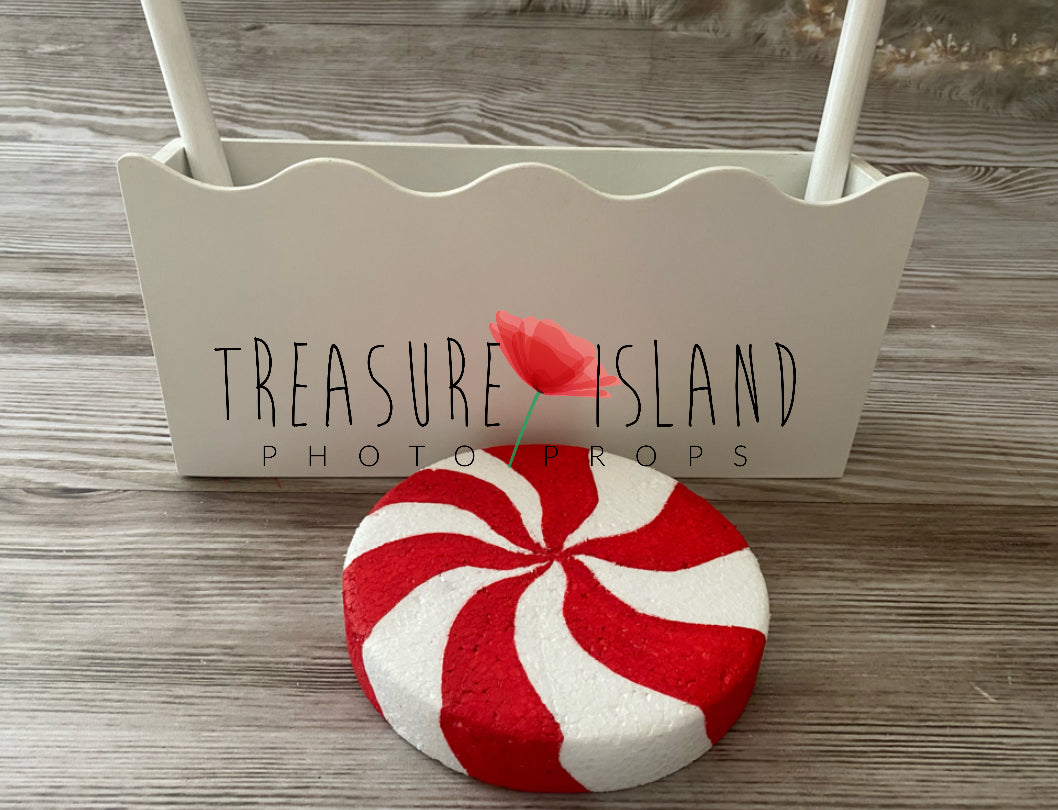 Giant red and white peppermint candy disc for Christmas and Cake Smash photography setups