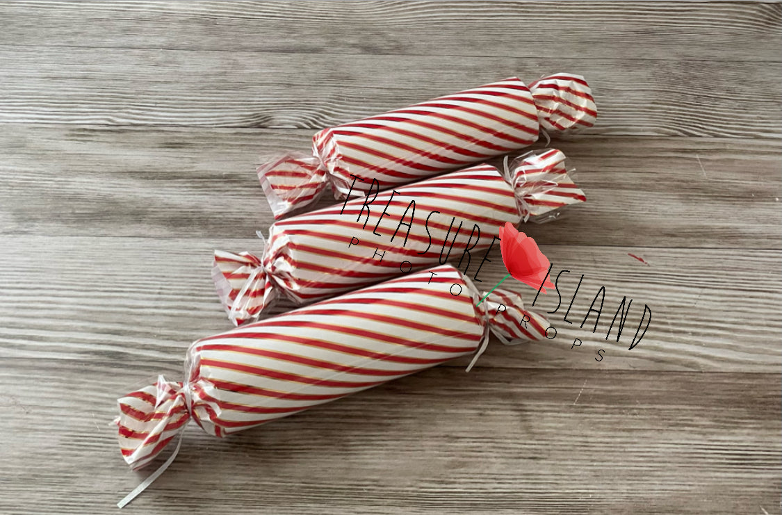 Oversized red and white lollipop prop for Christmas and cake smash photography