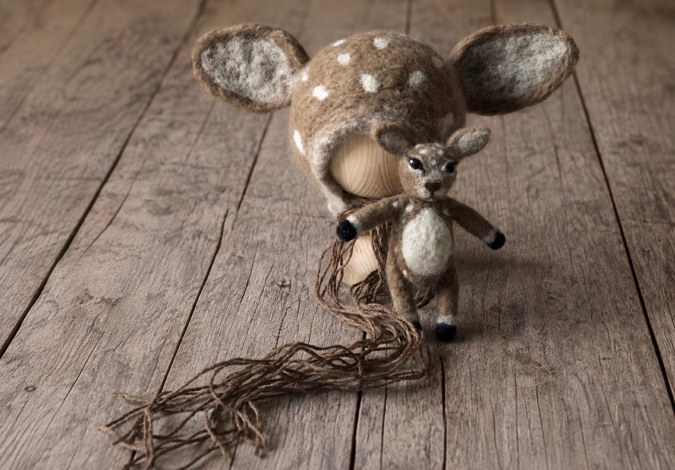 Hand-felted deer bonnet with spotted details and matching miniature deer toy for newborn photography
