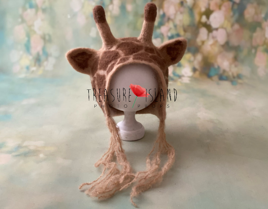 Beige and brown hand-felted giraffe bonnet with long wool ties for newborn and sitter photography