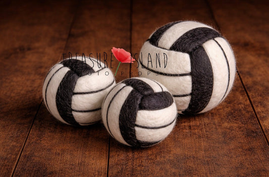 Hand-felted black and white volleyball balls in three sizes for newborn and sitter photography