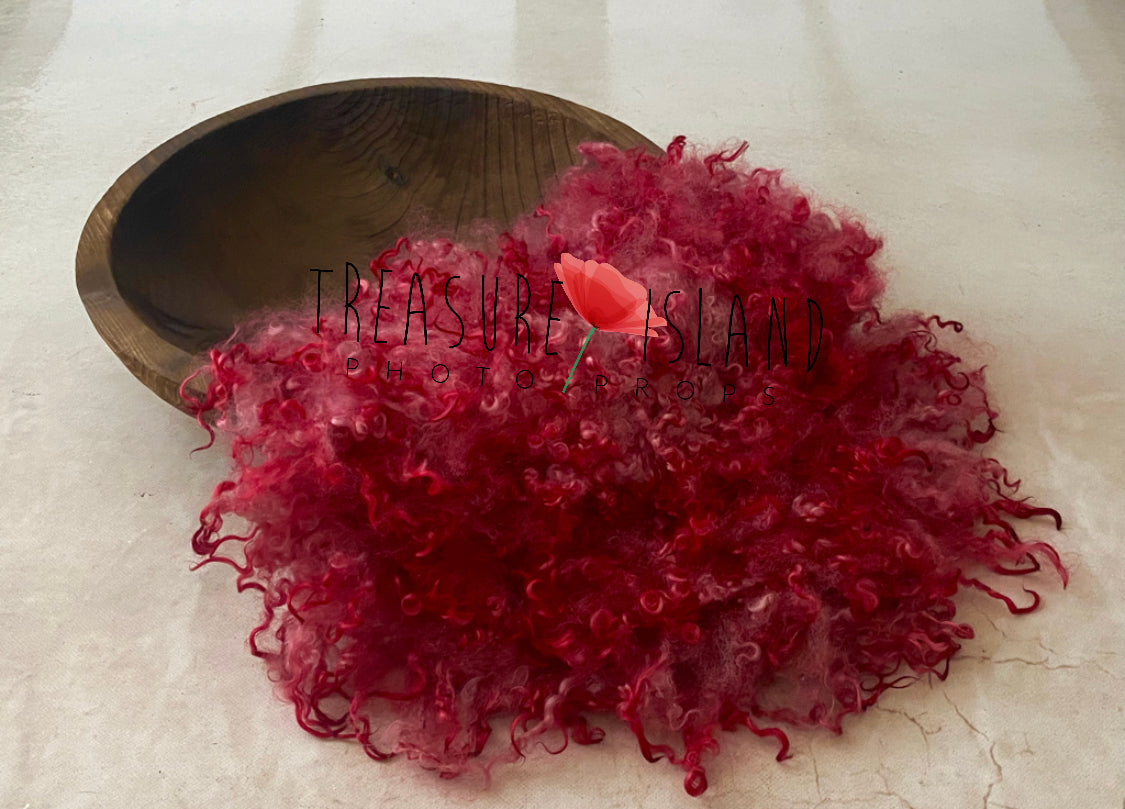 Handmade red curly wool blanket with natural sheep locks for newborn photography
