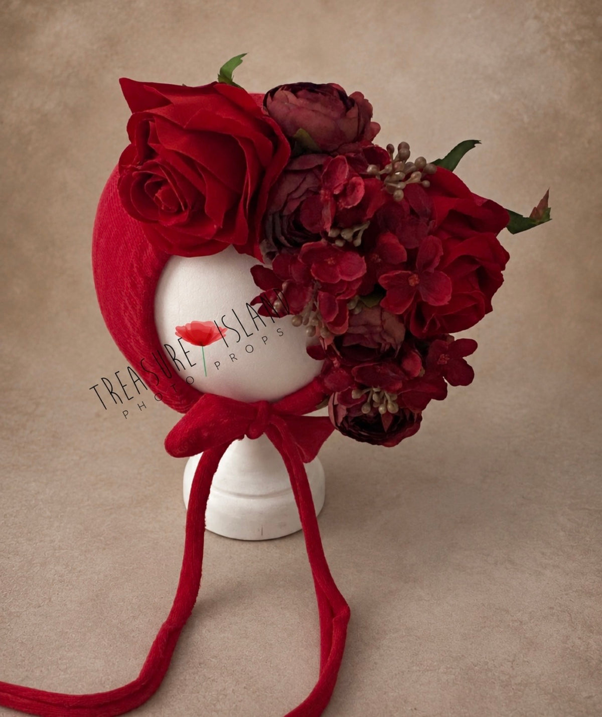 Handmade red photography bonnet decorated with artificial roses and burgundy flowers