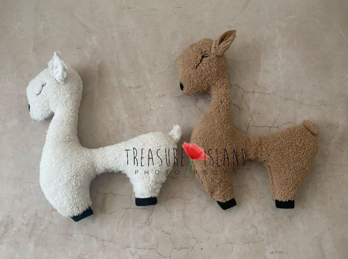 Two soft lamb posing pillows in cream white and warm beige for newborn photography