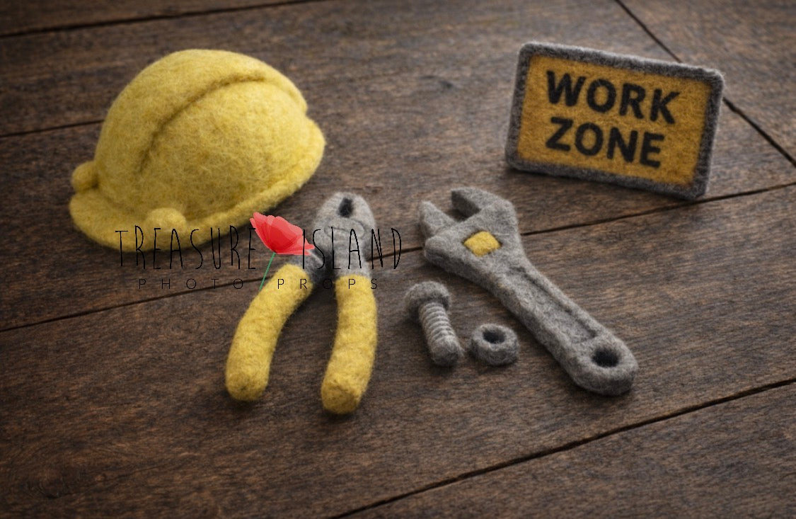 Hand-felted Little Builder newborn construction photography set with yellow helmet, miniature tools and WORK ZONE sign