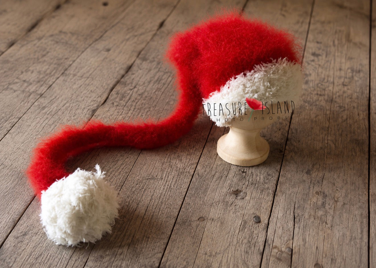 Long red knitted Santa hat with fluffy white trim and pompom for newborn Christmas photography