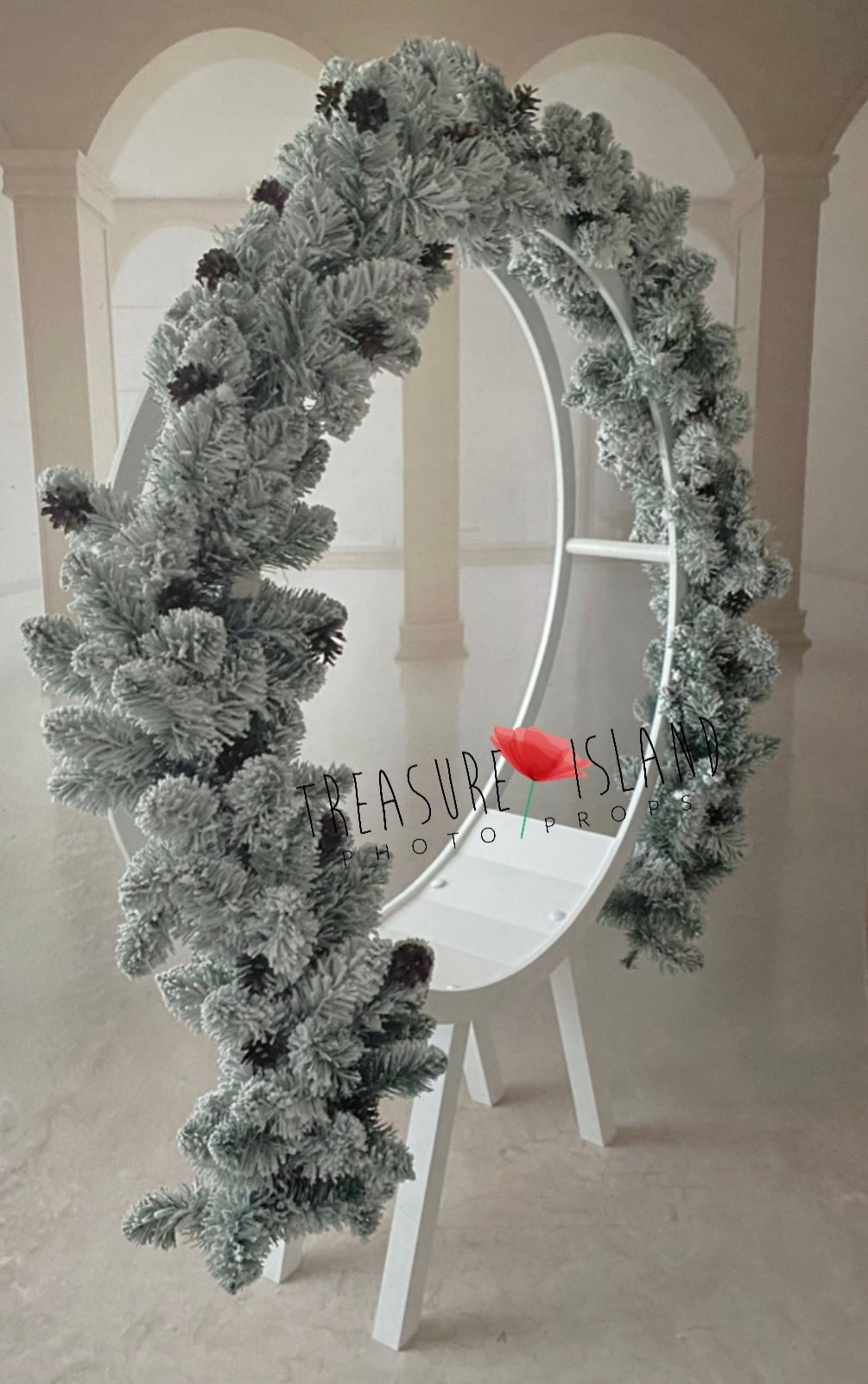 Side view showing the full layered volume of a frosted Christmas photography garland