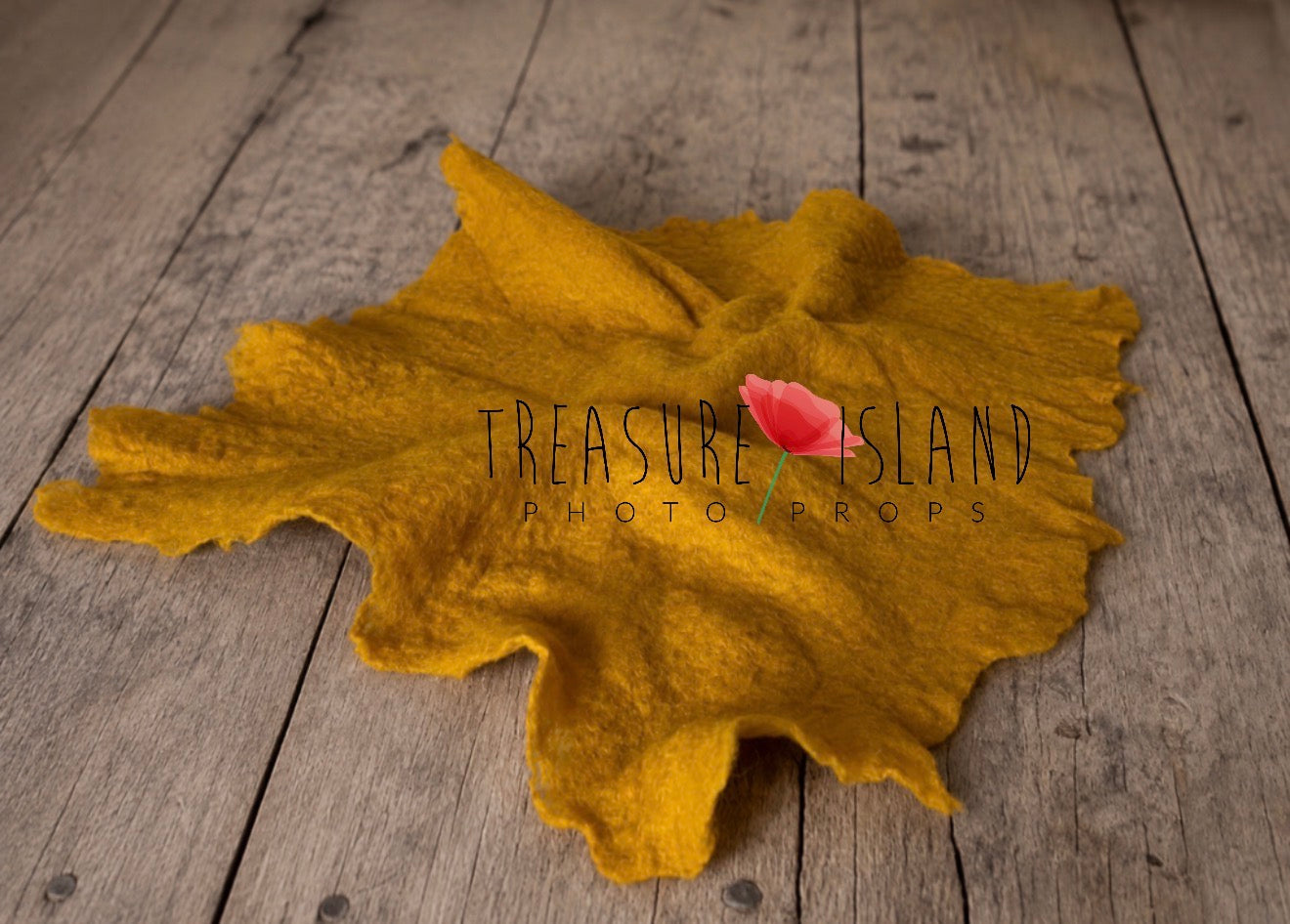 Mustard hand-felted irregular wool blanket with organic edges for newborn photography