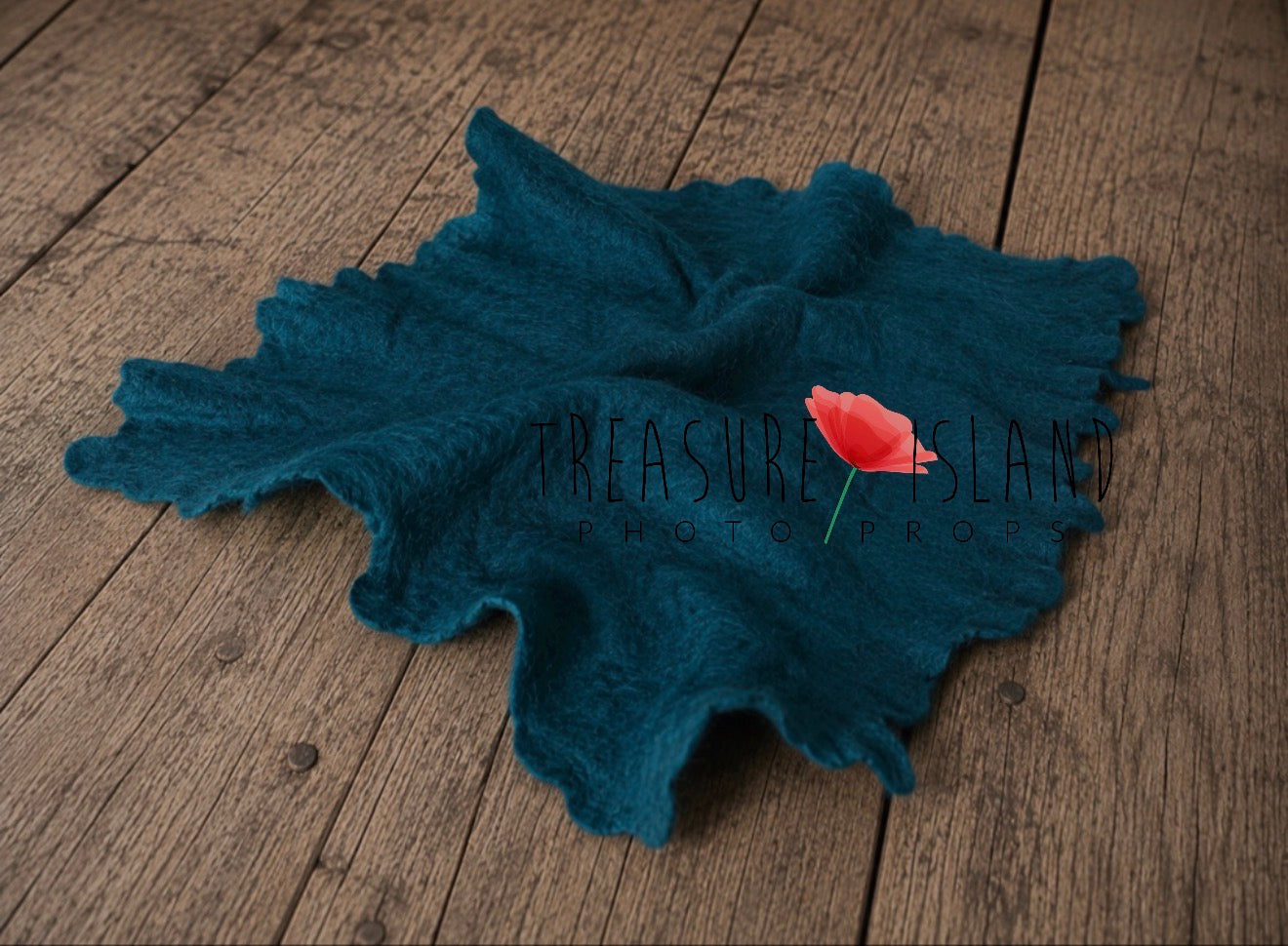 Petrol blue hand-felted irregular wool blanket with textured organic edges for newborn photography