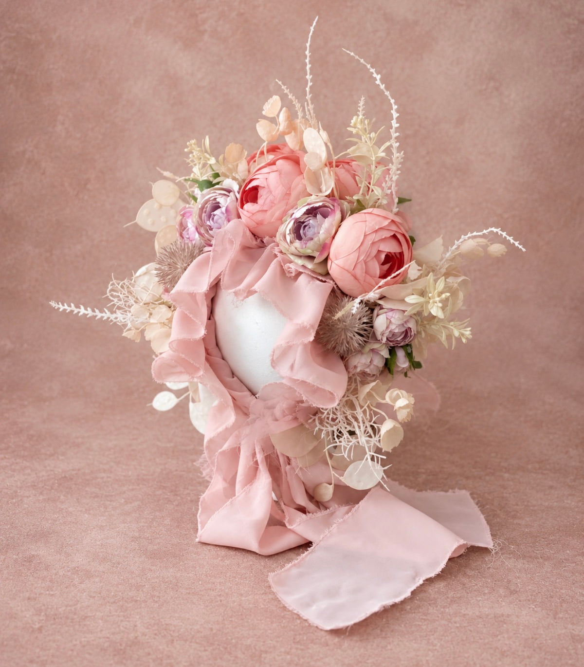 Handmade pink floral photography bonnet with coral blooms and delicate ivory botanical accents