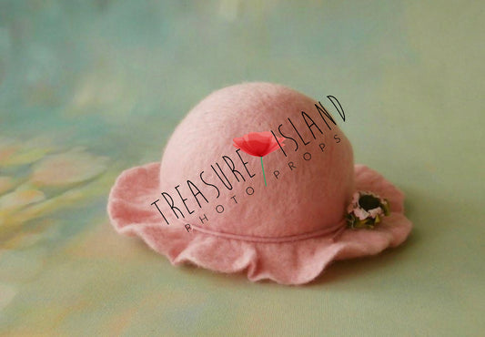 Pink handmade wool felted hat with waved brim and floral decoration for newborn photography