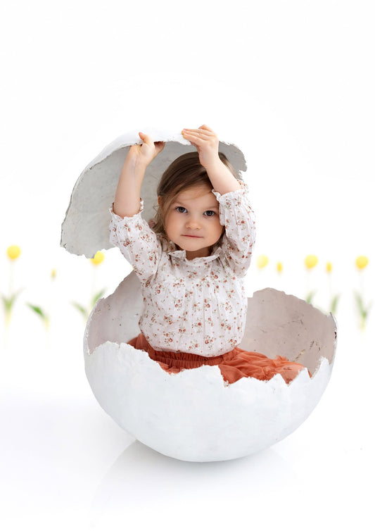 Handmade plaster eggshell sitter photography prop with matching smaller shell piece