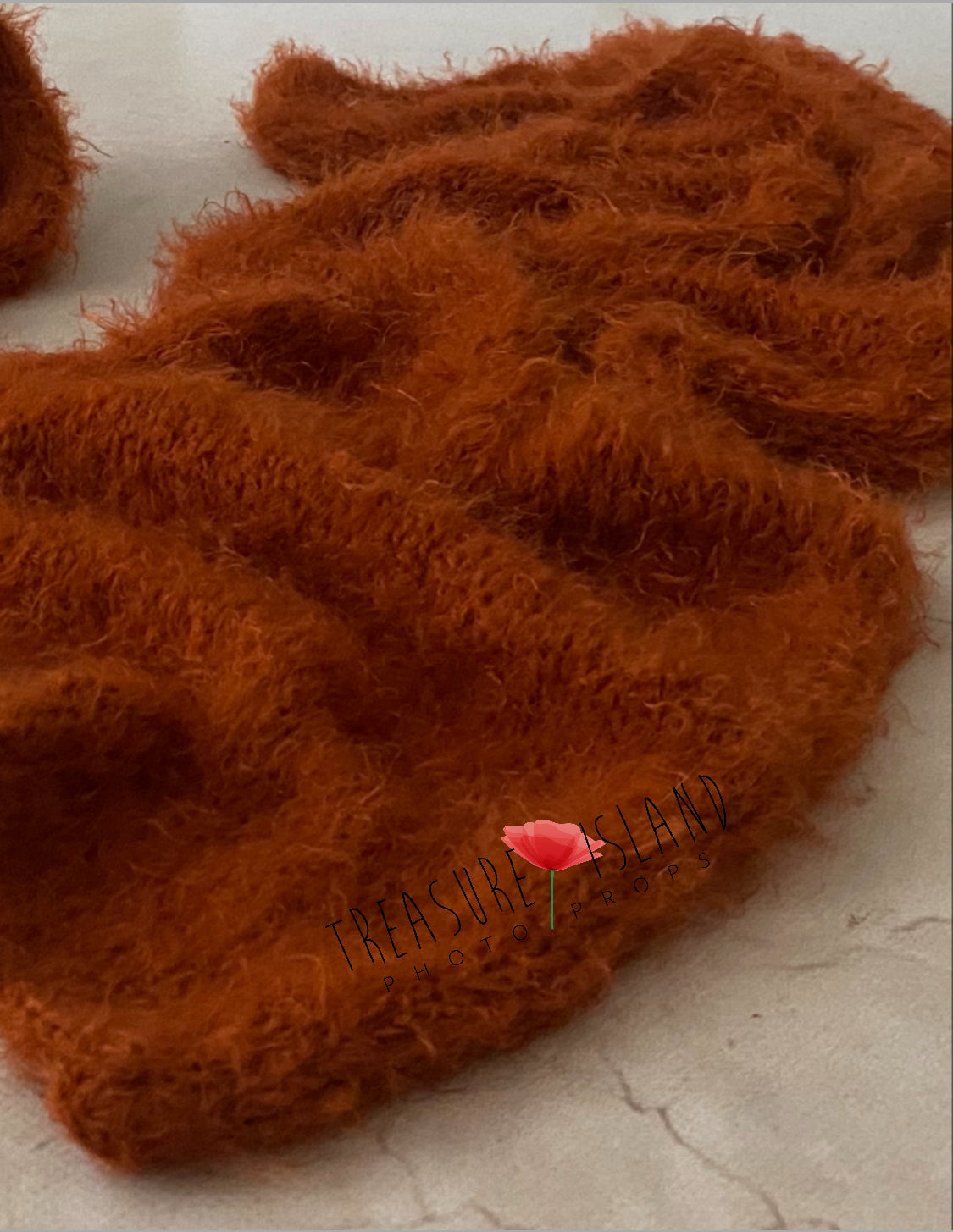 Close-up of the soft fluffy knitted texture of the Rusty Fox newborn photography wrap