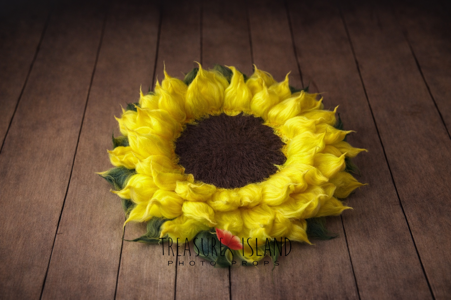 Close view of layered wool petals on felted sunflower blanket