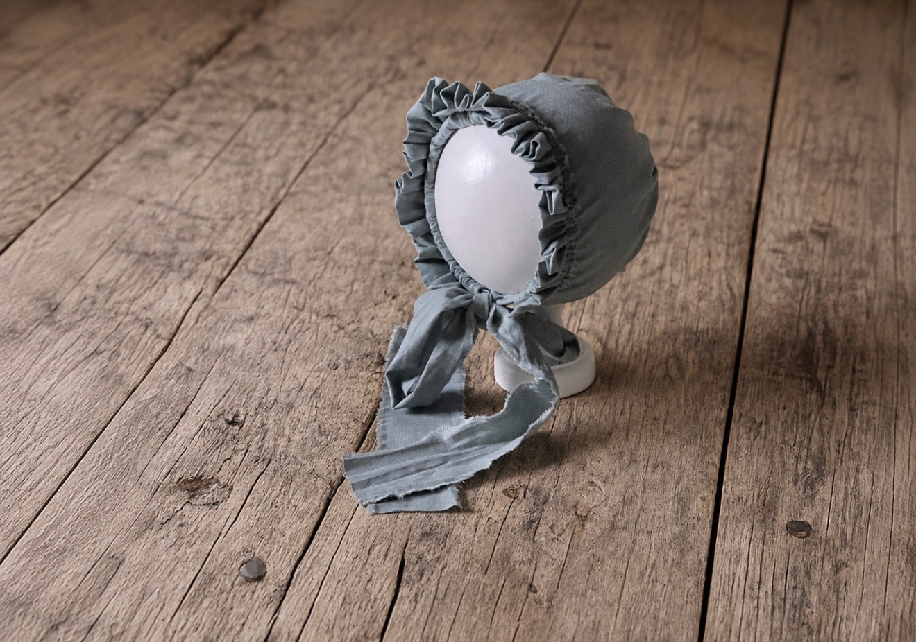 Susie vintage ruffle bonnet with long ties, handmade photography prop for newborn and sitter portraits.