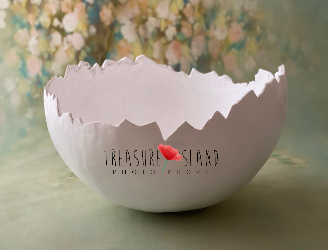 Unique handmade plaster eggshell showing individually created broken edge