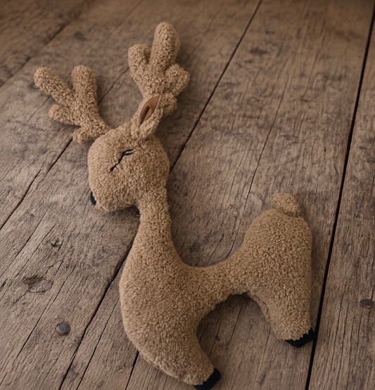 Warm beige reindeer newborn posing pillow with soft antlers and curved neck